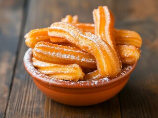 Wall Mural - Bowl of Freshly Made Churros Sprinkled with Sugar