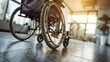 Close-up on a manual wheelchair and user in a light-filled room