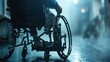 Detail of a wheelchair with a person's arm, clinical setting background