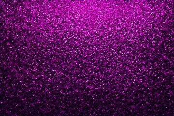 A purple background with glittery dots