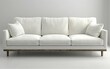 © AdibaZR - Modern white sofa with soft cushions on a wooden base against a gray background