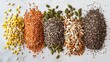 Vibrant top shot of a blend of essential seeds: chia, flax, pumpkin, sunflower, and sesame, perfect for health ads, on a clean isolated background