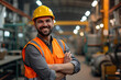 © Anasaiimages - Smiling engineer in hard hat and reflective vest inside an industrial facility with machinery. Generative AI