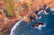 Aerial view of Rocky terrain along ocean shore in Madeira Island in Europe.