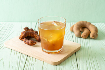 Poster - Delicious sweet drink tamarind juice and ice cube