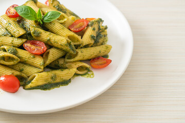 Canvas Print - penne pasta with pesto sauce and tomatoes