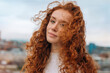 © Iryna - portrait of amazing young redhead lady exploring city