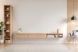 © Land Stock - Mockup a cabinet television wall mounted with decoration in living room and white wall