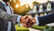 © Your Hand Please - Real estate handshake and Agent and customer seal deal with home blurred in background