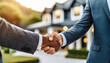 © Your Hand Please - Real estate handshake and Agent and customer seal deal with home blurred in background