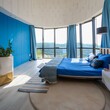 interior of a bedroom, modern living room with a window, a modern bedroom, modern architeture ,blue color building structure, Ai Generate