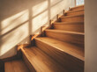 © silapin - Modern wooden stairs in a warm house.