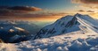 Panoramic view of the snow-capped peaks of the Caucasus Mountains at sunset