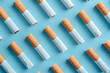 pattern of cigarettes on minimal background, top view, no tobacco stop smoking anti drug day concept