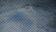 Looking up at a chain link fence with blue sky and clouds. wire fence. Chain link fence see sky. Opening in metallic fence. blue sky. Challenge. breakthrough concept.