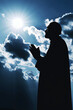 Silhouette of Muslim people praying