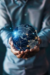 Wall Mural - business professional cradling a glowing networked globe against a dark background