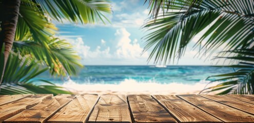 Wall Mural - Photo of Wooden table on tropical beach with palm leaves and blue sea background