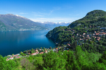 Wall Mural - The Alps and Lake Como during a spring morning, near the village of Varenna, Italy - April 14, 2024