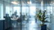 © Ilia Nesolenyi - A blurred view of an office hallway showing modern architecture and sleek design