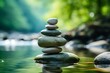 zen stones on the water in the forest - shallow depth of field