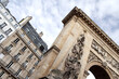 Buildingss and monument at Porte Saint Denis corner in Paris
