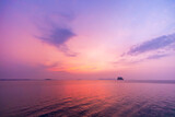 Fototapeta  - Sunset sky with sea and island background