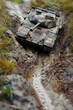 Intricate RC Tank in an Action-Packed Terrain Adventure: A Display of Cunning Design and Superior Control.