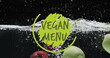 Image of vegan menu text over fruit falling in water background