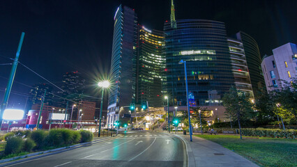 Milan skyline with modern skyscrapers in Porta Nuova business district night timelapse hyperlapse in Milan, Italy