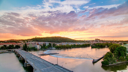 Wall Mural - The View on Prague Hill Petrin timelapse with Owl's Mills after Sunset with beautiful colorful sky, Czech Republic