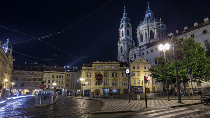 Sticker - Night view of the illuminated malostranske namesti square timelapse hyperlapse in prague