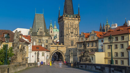 Poster - A view along Charles Bridge in Prague towards the Lesser Quarter in the morning timelapse.