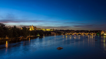 Poster - View of the city Prague in Czech Republic day to night timelapse on the Vltava river with beautiful sky