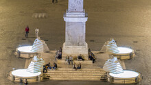 People Are Gathering Under The Central Column On Piazza Del Popolo During Night Timelapse