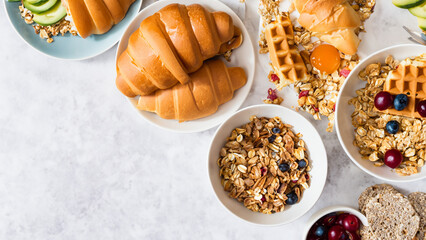 Wall Mural - Healthy sunday breakfast with croissants, waffles, granola and sandwiches. Generative AI