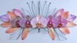 An artful composition of orchids arranged symmetrically, showcasing a spectrum of soft pink and purple hues with intricate petal patterns.