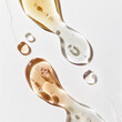 © Sawoon - Studio beauty photo of skincare serum liquid spread smudge isolated on white background anti ageing skin beauty product campaign ad close-up brown clear drops vitamin a c peptides collagen retinal