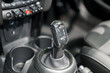 Close up of Modern car automatic gearbox and control buttons..