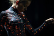 Integration of conductive threads into futuristic piece of wearable innovation technology. Sustainable fashion with flexible batteries and smart textiles. Flexible battery power in clothing industry.