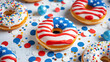 © Natalia - Sugar cookie donuts decorated with red, white and blue icing in American flag patterned design on top. Decorating a holiday food table. Independence Day or Memorial Day celebration. 4th Of July.