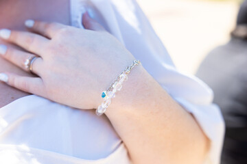 Wall Mural - Bracelet on a brides wrist from a recent wedding