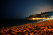 Coastline of sandy beach at night in Spain