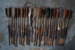 A quiver filled with arrows, each one feathered and sharpened for accuracy.