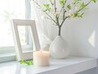 Serene corner with candle and frame.