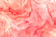 Pale coral alcohol ink swirls with a smooth marble effect, in full ultra HD