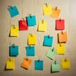 © Adobe Contributor - b'Colorful sticky notes on a cork board'