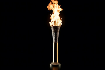 Closeup, Olympic Games fire torch isolated on black background