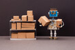 The robot sorts parcels and items, arranges cardboard boxes on the shelves, order storage process.