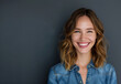 © Peopleimages - AI - Portrait, woman and happy by studio background for mindset, creative career and designer. Gen z girl, isolated smile and entrepreneur with mockup for startup, mission and professional goals in Canada